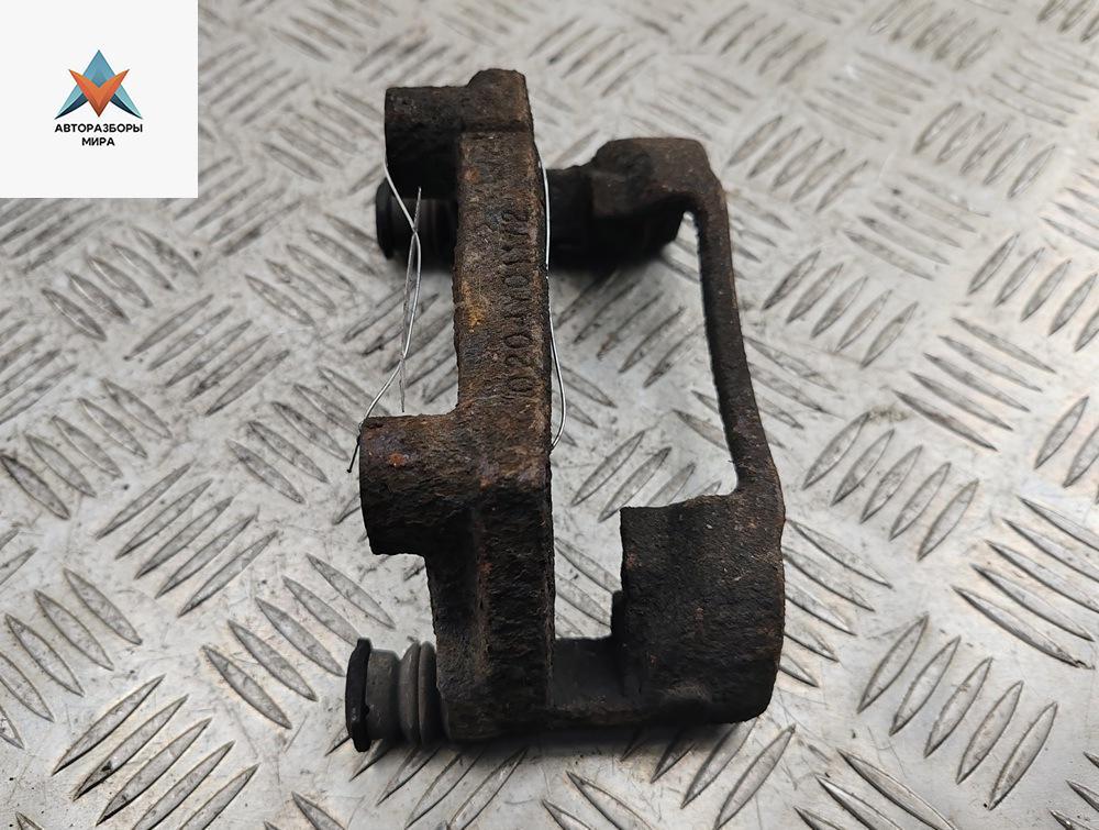 скоба суппорта Ford Mondeo 3 поколение 2002, 1.8 л., бензин, МКПП, серый, универсал - фото №1