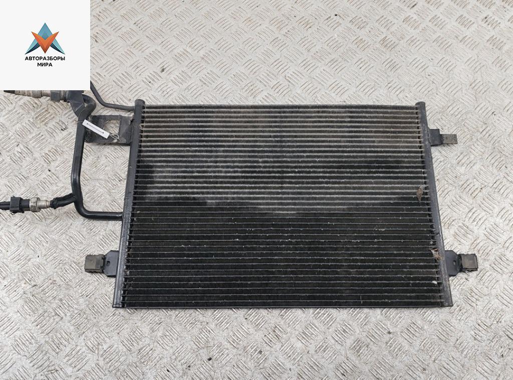 радиатор кондиционера Volkswagen Passat B5 1999, 1.8 л., бензин, МКПП, зелёный, универсал - фото №1