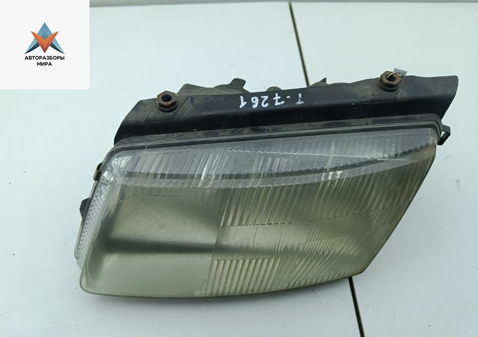 фара левая Volkswagen Passat B5 1999, 1.8 л., бензин, МКПП, зелёный, универсал, 747425-00 - фото №1