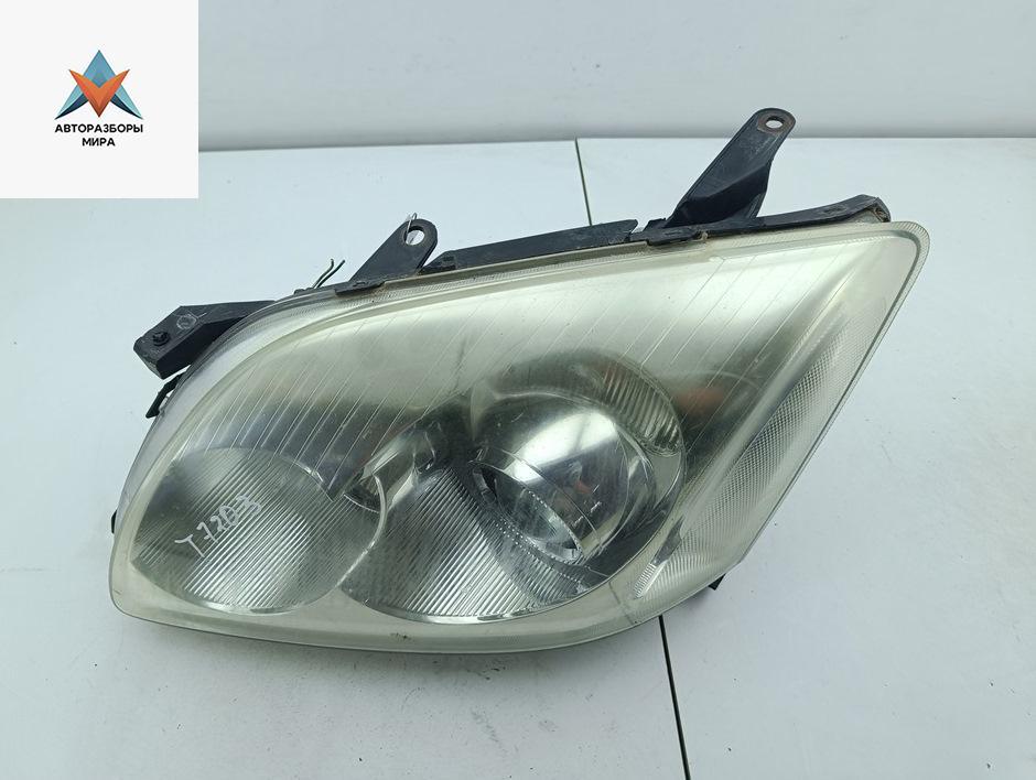 фара левая Toyota Avensis 2 поколение (T250) 2005, 2.2 л., дизель, МКПП, серый, универсал - фото №1