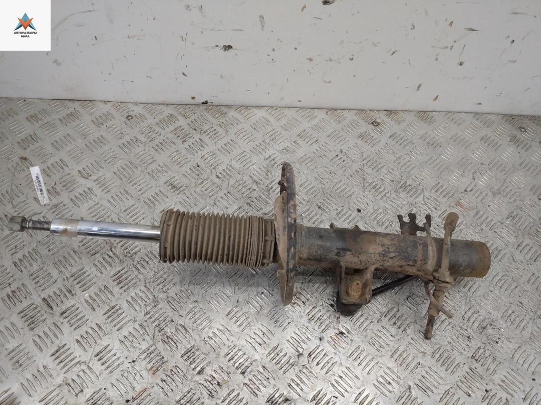 амортизатор передний левый Volkswagen Transporter T5 2006, 2.5 л., дизель, МКПП, белый, микроавтобус - фото №1