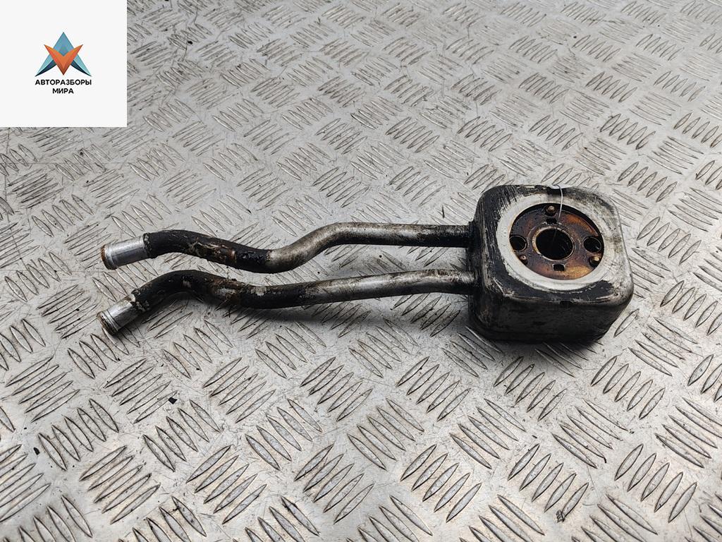 теплообменник масляного фильтра Volkswagen Golf 4 поколение 2001, 1.6 л., бензин, МКПП, чёрный, хетчбэк 5 дв. - фото №1