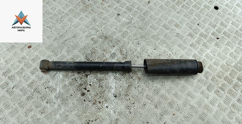 амортизатор задний левый Fiat Stilo 1 поколение 2003, 1.6 л., бензин, МКПП, чёрный, хетчбэк 5 дв., 50702693 - фото №1