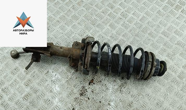 стойка передняя Fiat Stilo 1 поколение 2003, 1.6 л., бензин, МКПП, чёрный, хетчбэк 5 дв. - фото №1