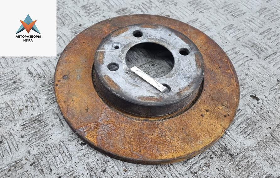 диск тормозной передний Volkswagen Passat B4 1996, 1.8 л., бензин, МКПП, красный, универсал, 256D - фото №1