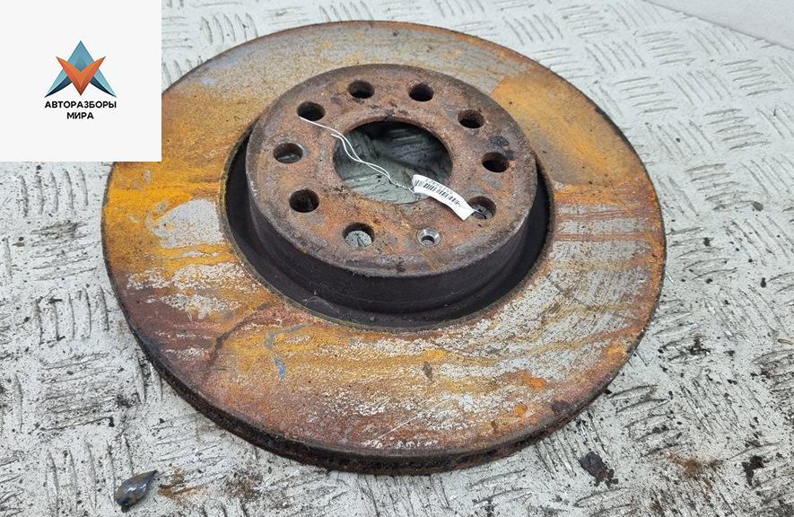 диск тормозной передний Volkswagen Passat B6 2007, 2.0 л., дизель, МКПП, синий, универсал - фото №1