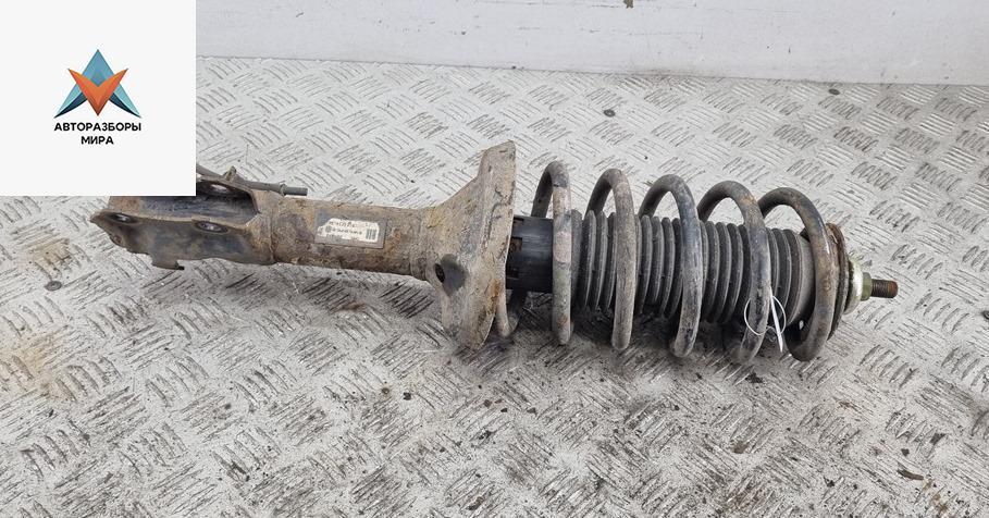 стойка передняя Volkswagen Passat B4 1996, 1.8 л., бензин, МКПП, красный, универсал - фото №1