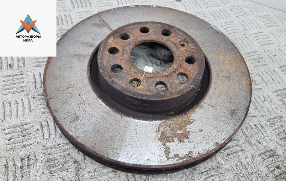 диск тормозной передний Volkswagen Passat B6 2007, 2.0 л., дизель, МКПП, синий, универсал - фото №1