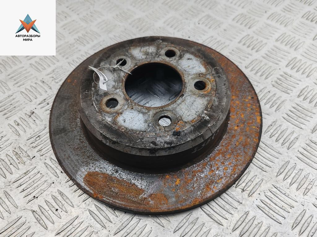 диск тормозной задний Chrysler Voyager 3 поколение 1999, 3.3 л., бензин, АКПП, синий, минивэн - фото №1