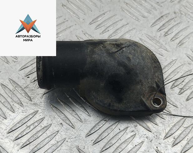 корпус термостата Volkswagen Transporter T4 1994, 2.4 л., дизель, МКПП, белый, микроавтобус, 074121121 - фото №1