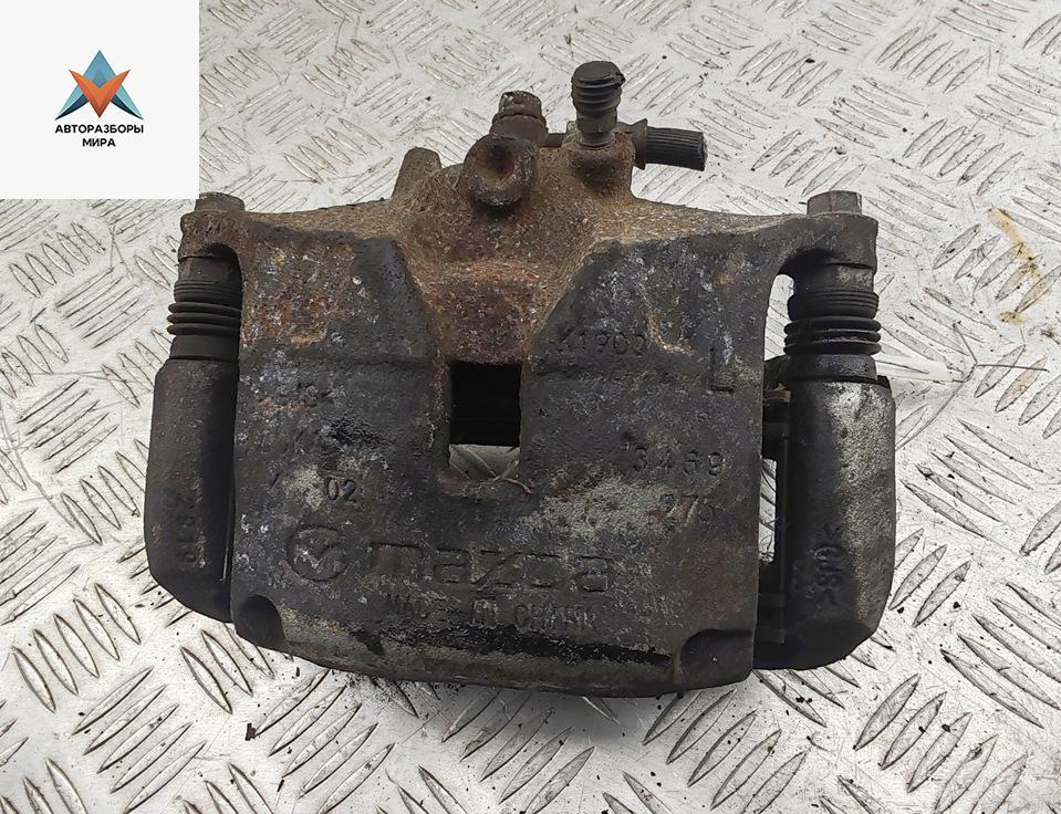 суппорт передний левый Mazda 3 BP 2019, 2.0 л., гибрид, МКПП, чёрный, хетчбэк 5 дв. - фото №1