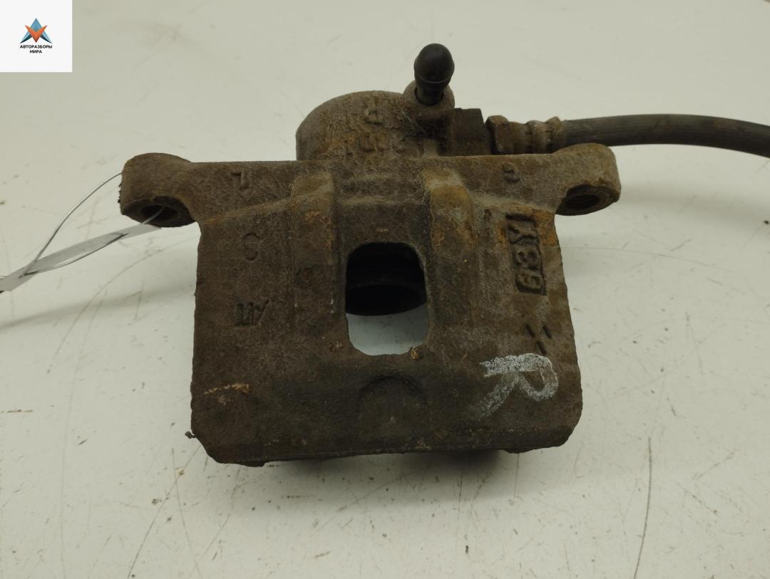 суппорт задний правый Mitsubishi Outlander 1 поколение 2006, 2.0 л., бензин, МКПП, чёрный, внедорожник 5 дв. - фото №1