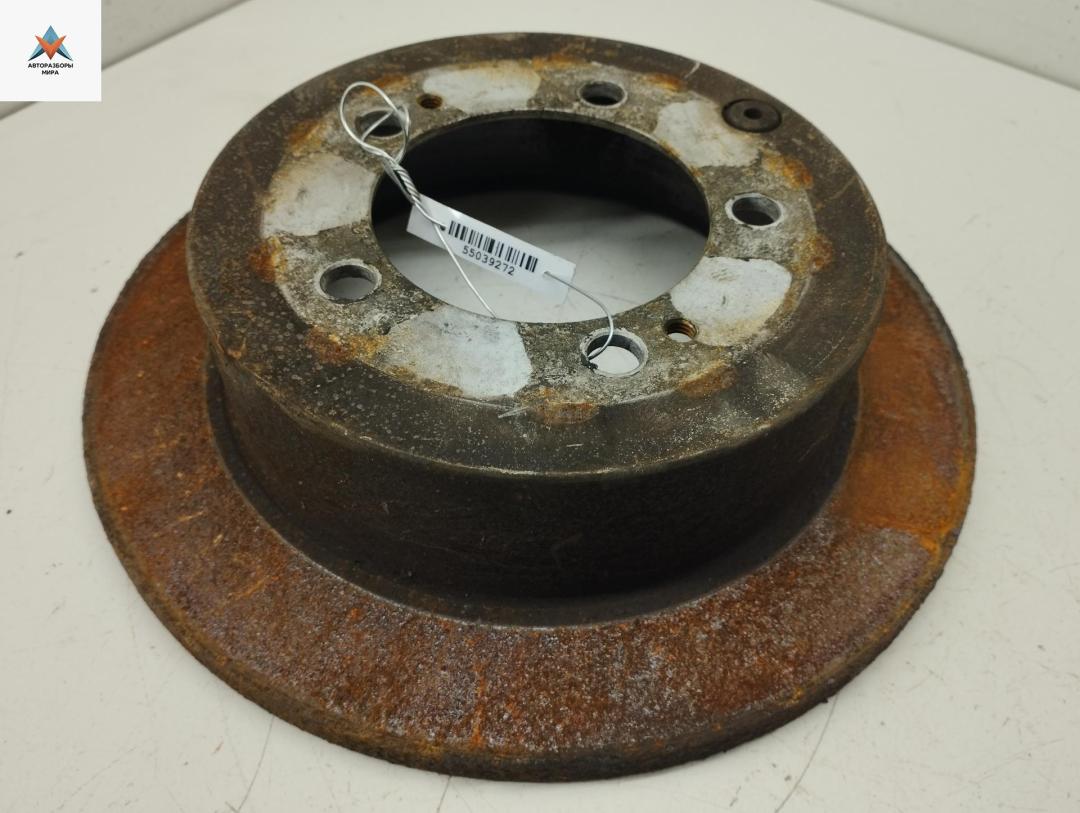 диск тормозной задний Mitsubishi Outlander 1 поколение 2006, 2.0 л., бензин, МКПП, чёрный, внедорожник 5 дв. - фото №1