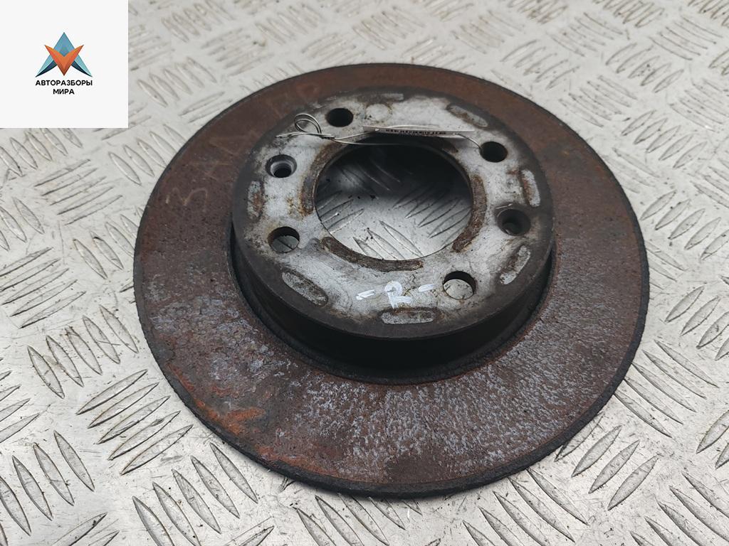 диск тормозной задний Peugeot 307 1 поколение 2003, 1.6 л., бензин, МКПП, серый, универсал - фото №1