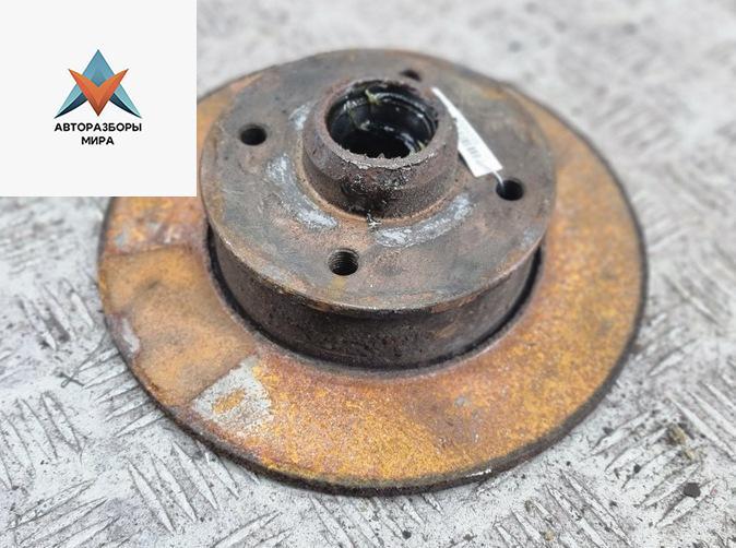 диск тормозной задний Volkswagen Passat B4 1993, 2.0 л., бензин, МКПП, синий, седан - фото №1