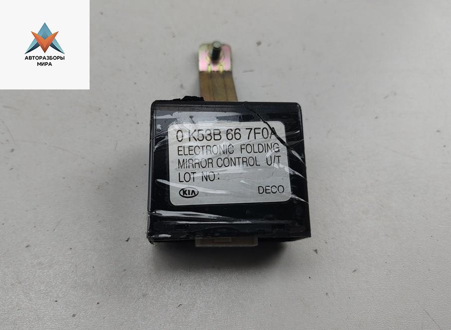 блок комфорта Kia Carnival VQ 2005, 2.9 л., дизель, МКПП, чёрный, минивэн, 0K53B667F0A - фото №1