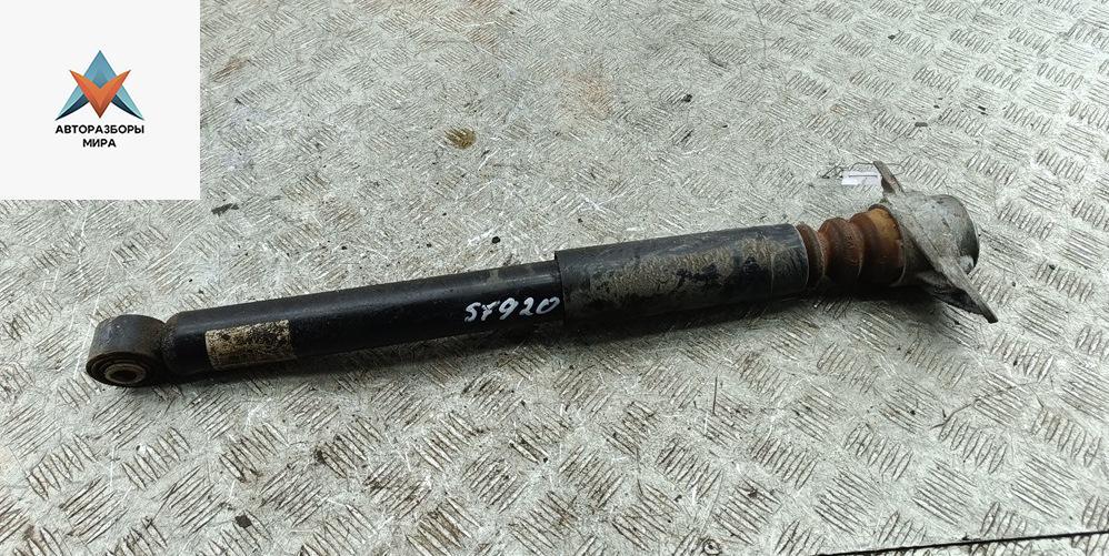 амортизатор задний правый Volkswagen Golf 6 поколение 2011, 1.6 л., дизель, МКПП, белый, хетчбэк 5 дв. - фото №1