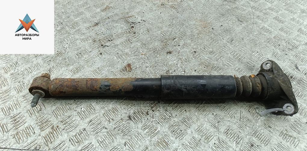 амортизатор задний левый Volkswagen Passat B6 2007, 2.0 л., дизель, МКПП, коричневый, универсал - фото №1