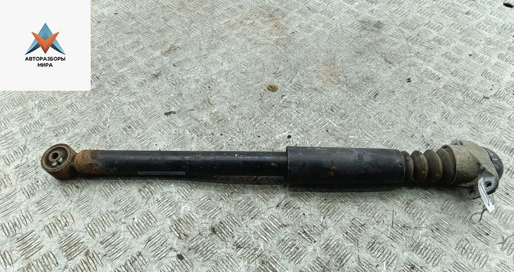 амортизатор задний левый Volkswagen Bora 1 поколение 2000, 2.0 л., бензин, МКПП, синий, седан - фото №1