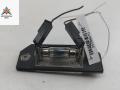 подсветка номера Ford Focus 2 поколение 2005, 1.6 л., дизель, МКПП, чёрный, универсал, 3M5A13550A - фото №2