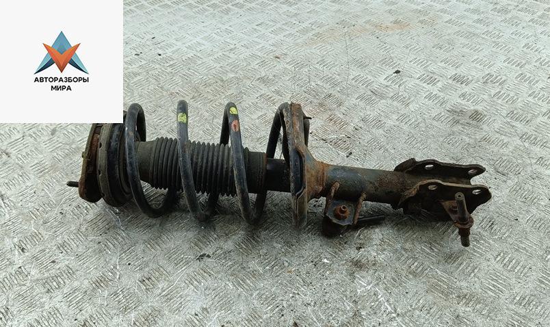 стойка передняя Kia Rio 2 поколение 2005, 1.6 л., бензин, МКПП, серый, хетчбэк 5 дв. - фото №1