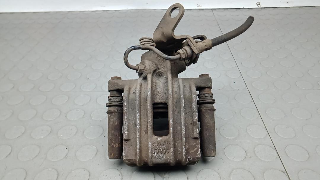 суппорт задний левый Skoda Yeti 1 поколение 2012, 1.2 л., бензин, МКПП, внедорожник 5 дв. - фото №1