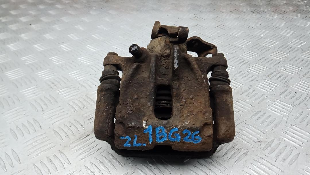 суппорт задний левый Volkswagen Transporter T4 1997, 1.9 л., дизель, МКПП - фото №1