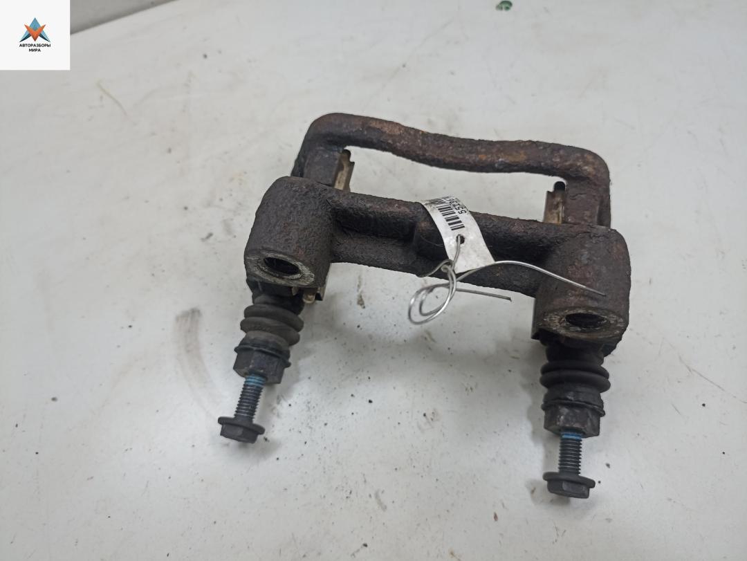 скоба суппорта Opel Zafira 1 поколение (A) 2002, 2.2 л., бензин, МКПП, серый, седан - фото №1