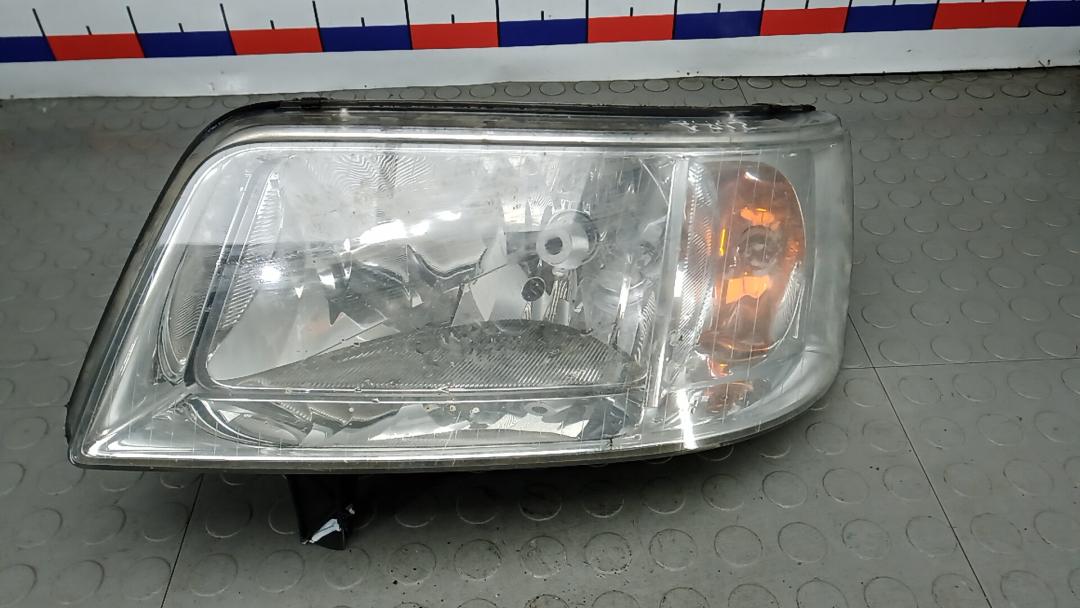 фара левая Volkswagen Transporter T5 2004, 2.5 л., дизель, МКПП, микроавтобус - фото №1