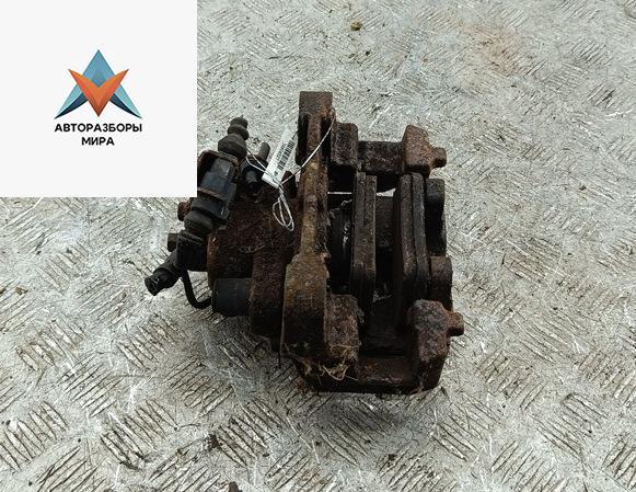 суппорт задний правый Volkswagen Touareg 1 поколение 2003, 2.5 л., дизель, АКПП, чёрный, внедорожник 5 дв. - фото №1