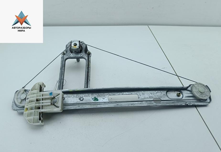 стеклоподъемник задний левый Ford Focus 1 поколение 1998, 1.4 л., бензин, МКПП, зелёный, универсал, XS41A27001AH - фото №1