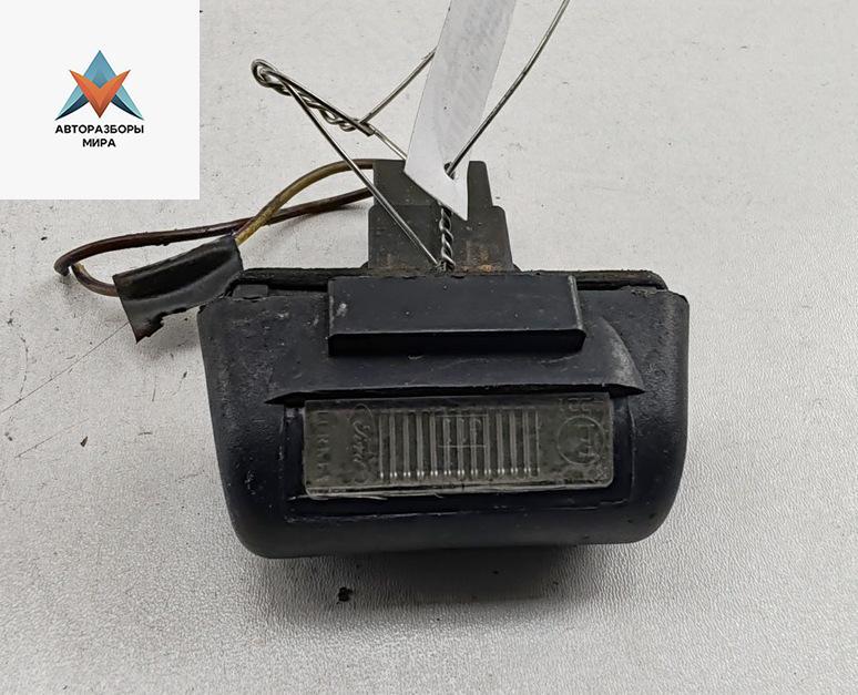 подсветка номера Ford Transit 7 поколение 2008, 2.4 л., дизель, МКПП, белый, микроавтобус - фото №1