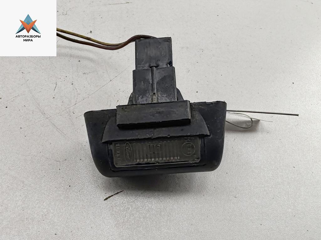 подсветка номера Ford Transit 7 поколение 2008, 2.4 л., дизель, МКПП, белый, микроавтобус - фото №1