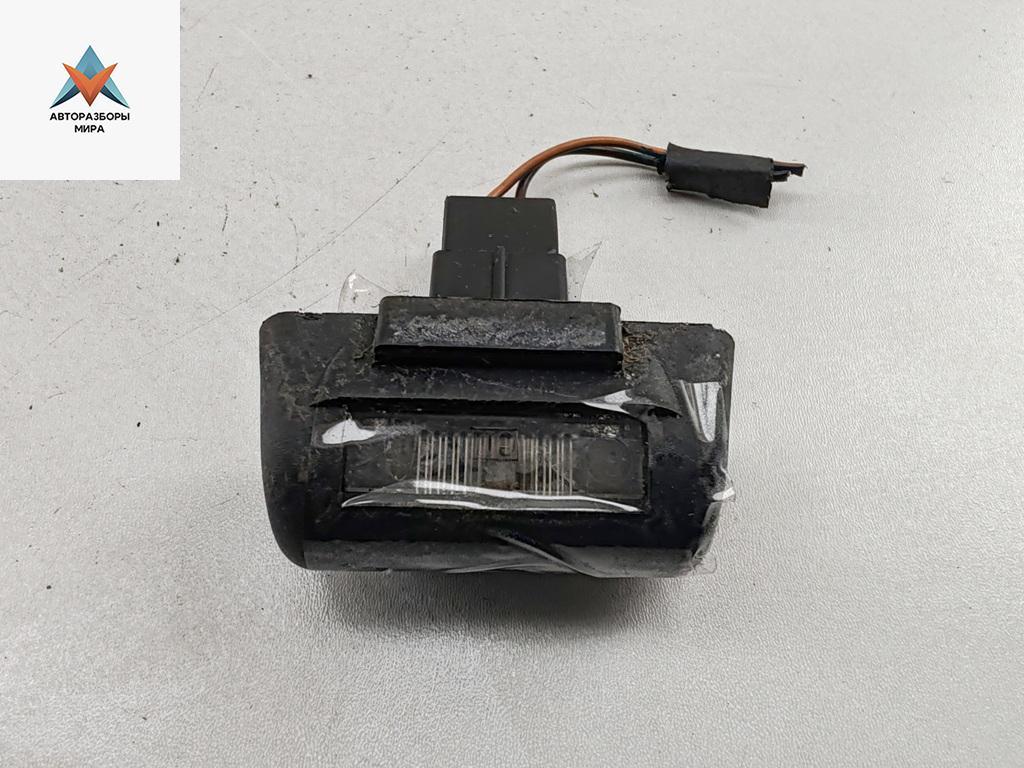 подсветка номера Ford Transit 6 поколение 2005, 2.0 л., дизель, МКПП, красный, микроавтобус - фото №1