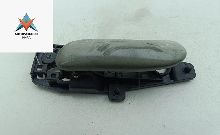 ручка внутренняя передняя левая Fiat Stilo 1 поколение 2003, 1.6 л., бензин, МКПП, чёрный, хетчбэк 5 дв. - фото №1