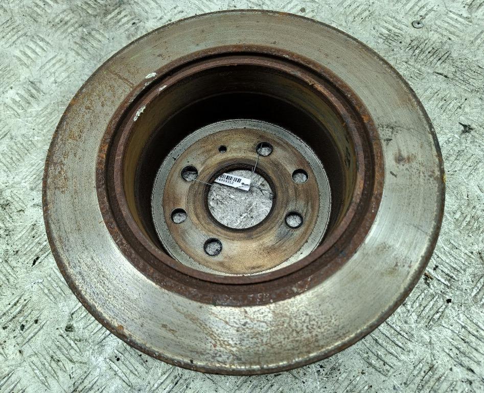 диск тормозной задний Opel Calibra 1990, 2.0 л., бензин, МКПП, красный, купе