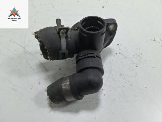 фланец (тройник) системы охлаждения Volkswagen Passat B5 [рестайлинг] 2002, 2.0 л., бензин, МКПП, чёрный, универсал, 06B121133A