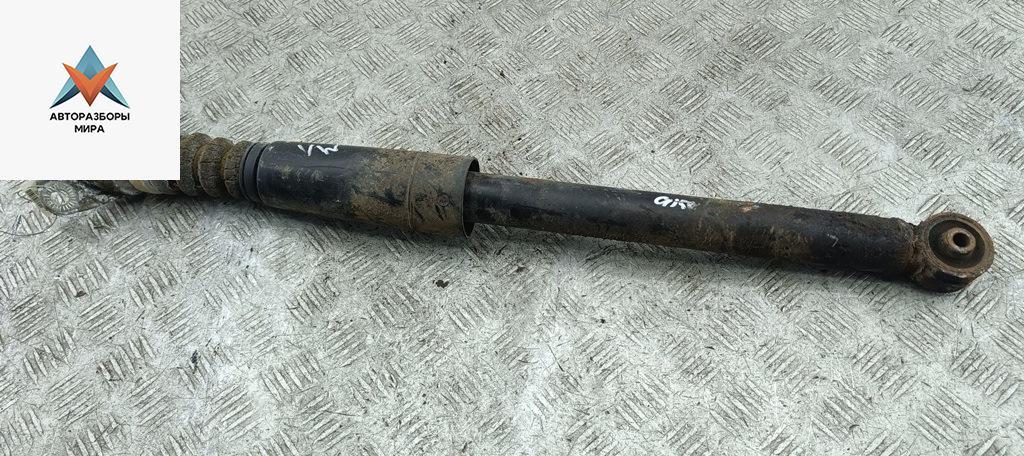 амортизатор задний левый Volkswagen Golf 4 поколение 2002, 1.4 л., бензин, МКПП, чёрный, хетчбэк 5 дв. - фото №1