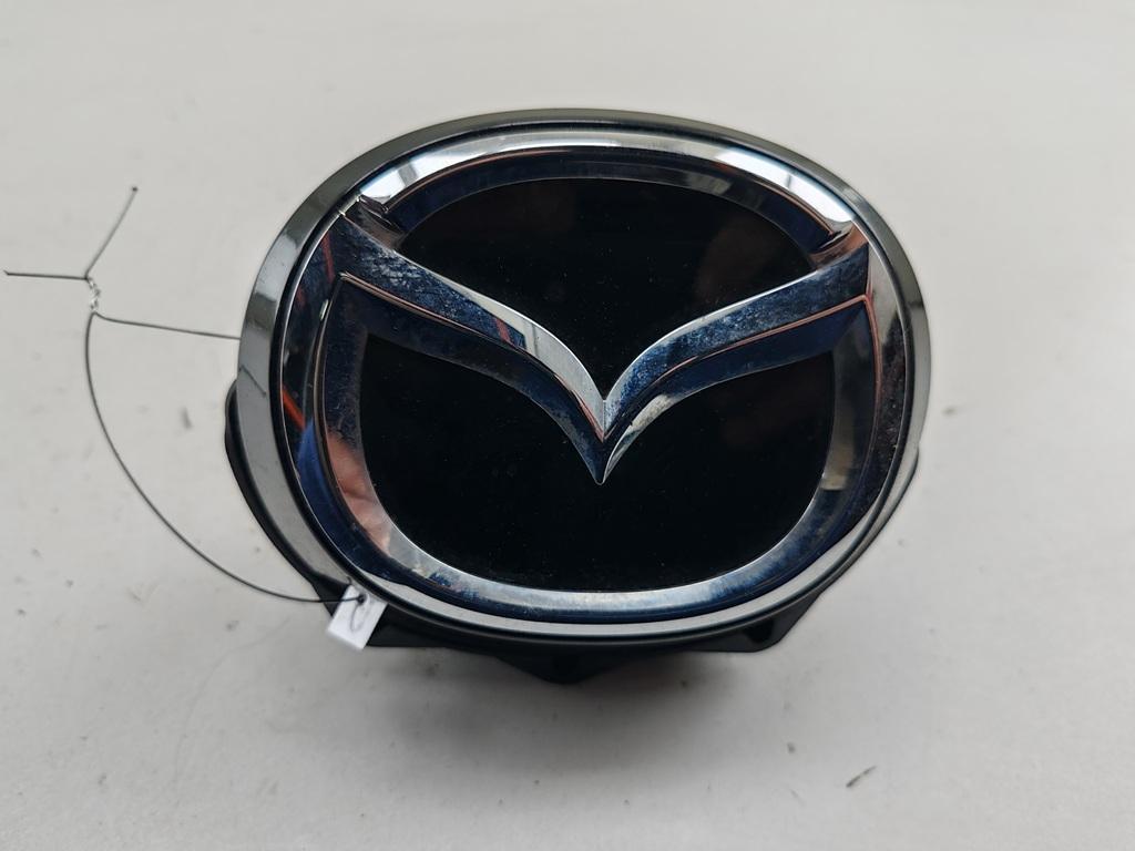 эмблема Mazda 3 Bp 2019, 2.0 л., гибрид, МКПП, чёрный, хетчбэк 5 дв., BDMT51730