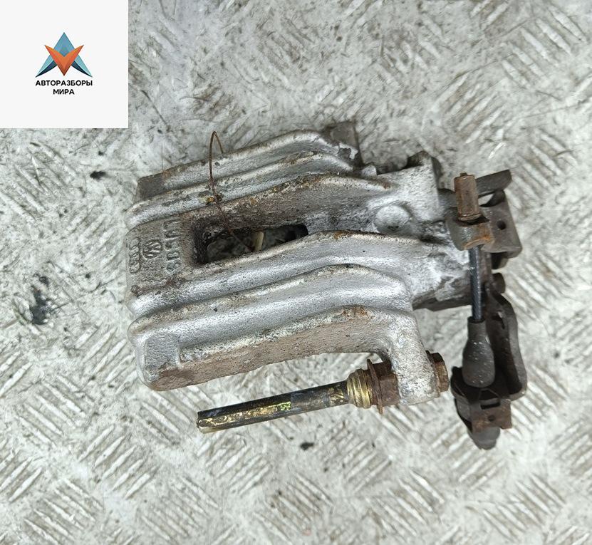 суппорт задний левый Volkswagen Golf 4 поколение 1999, 1.4 л., бензин, МКПП, синий, хетчбэк 5 дв. - фото №1