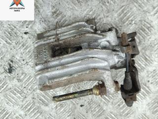 суппорт задний левый Volkswagen Golf 4 поколение 1999, 1.4 л., бензин, МКПП, синий, хетчбэк 5 дв.