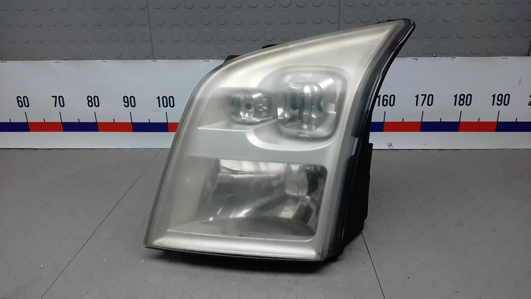 фара левая Ford Transit 7 поколение 2006, 2.2 л., дизель, МКПП, микроавтобус - фото №1