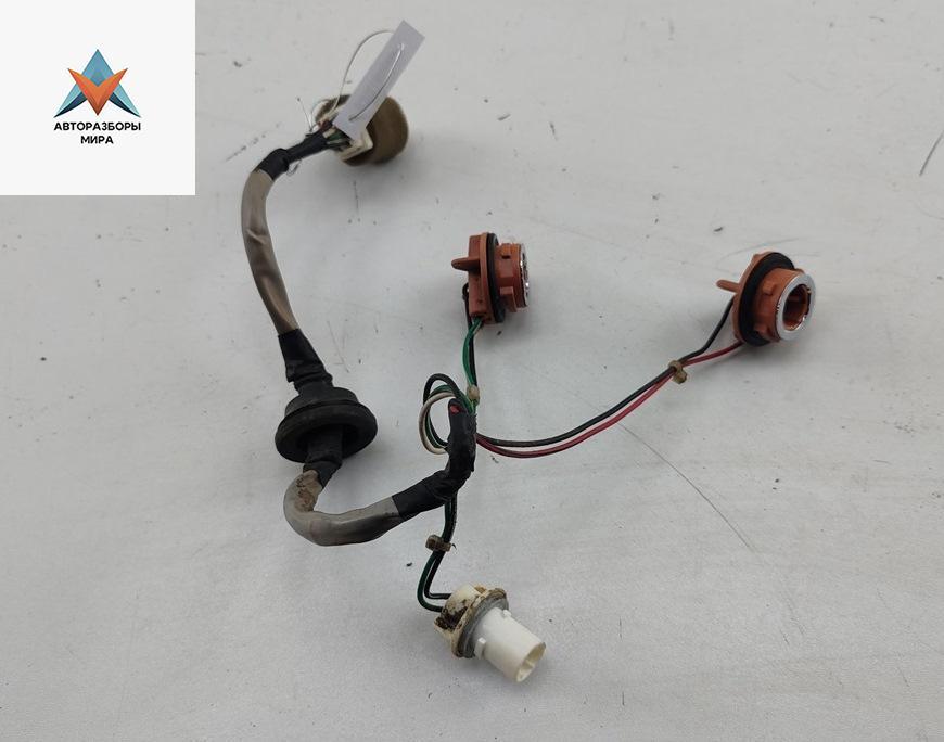 Патрон лампы фонаря Kia Rio 2 поколение 2005, 1.6 л., бензин, МКПП, серый, хетчбэк 5 дв. - фото №1