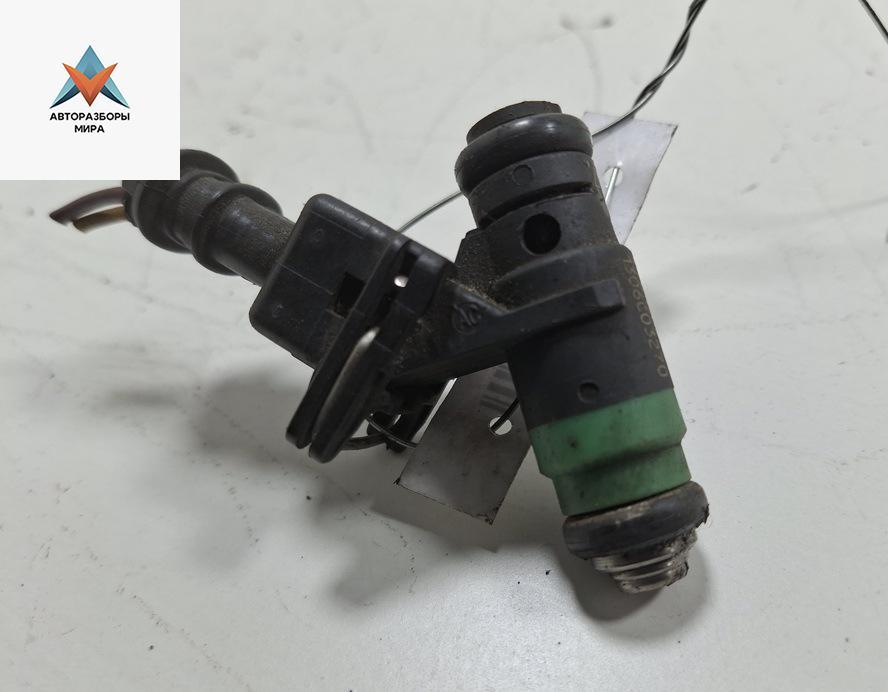 форсунка Renault Laguna 2 поколение 2002, 1.8 л., бензин, МКПП, серый, универсал, 1306C03270 - фото №1