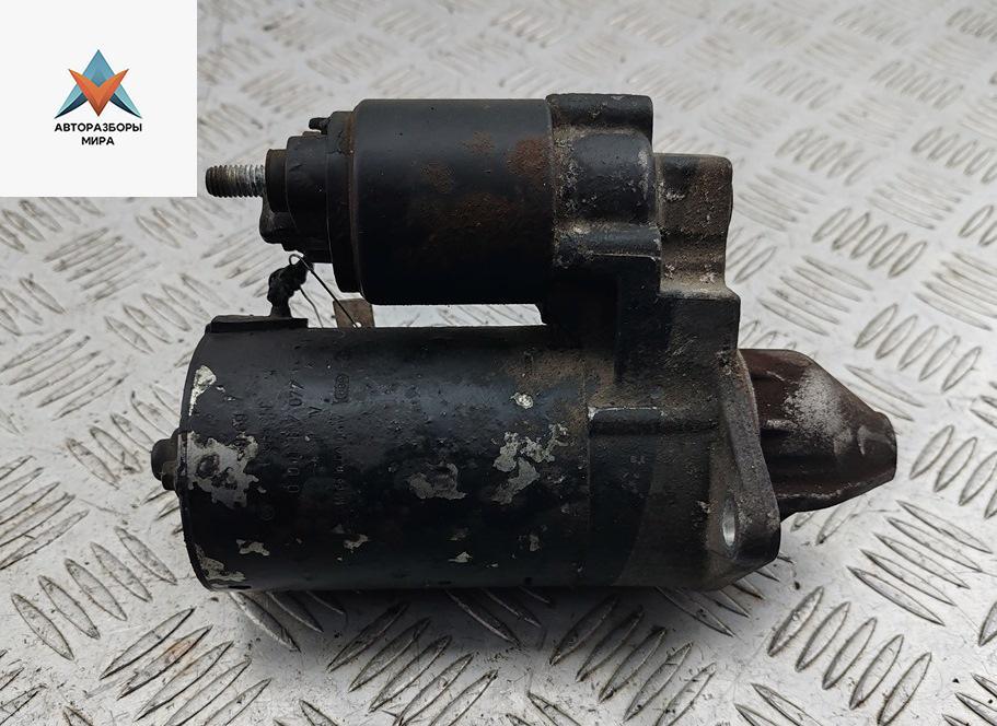 стартер Opel Astra G 1999, 1.8 л., бензин, МКПП, синий, универсал, 0001107077 - фото №1