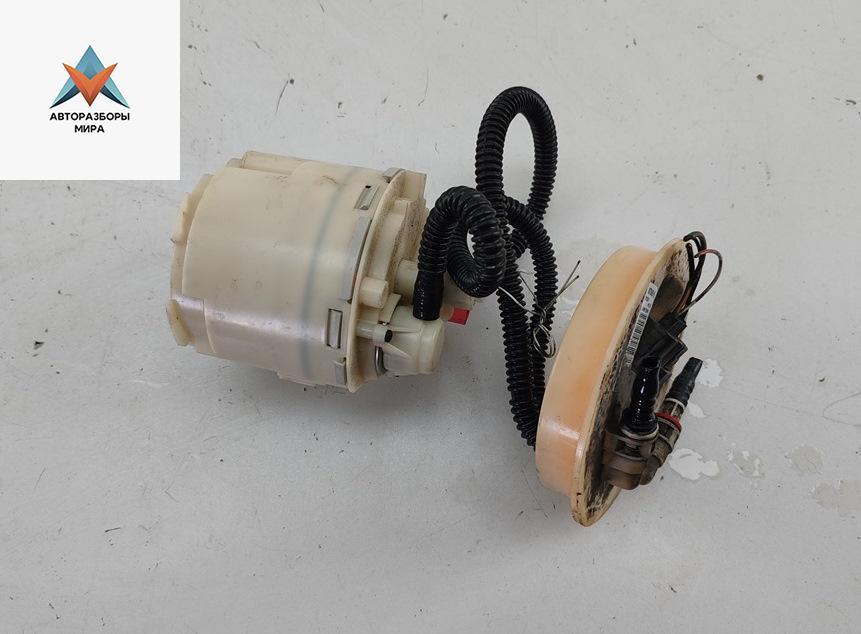 насос топливный Ford Mondeo 3 поколение 2001, 1.8 л., бензин, МКПП, зелёный, универсал, 1S7UAD9H307 - фото №1