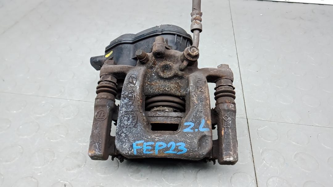 суппорт задний левый Hyundai Tucson 4 поколение 2022, 1.6 л., бензин, МКПП, внедорожник 5 дв. - фото №1