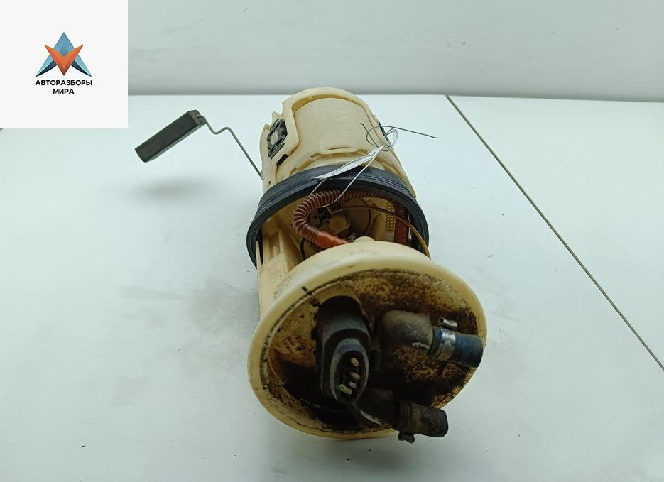 насос топливный Volkswagen Passat B5 1999, 1.6 л., бензин, МКПП, синий, универсал, 8E0919051 - фото №1