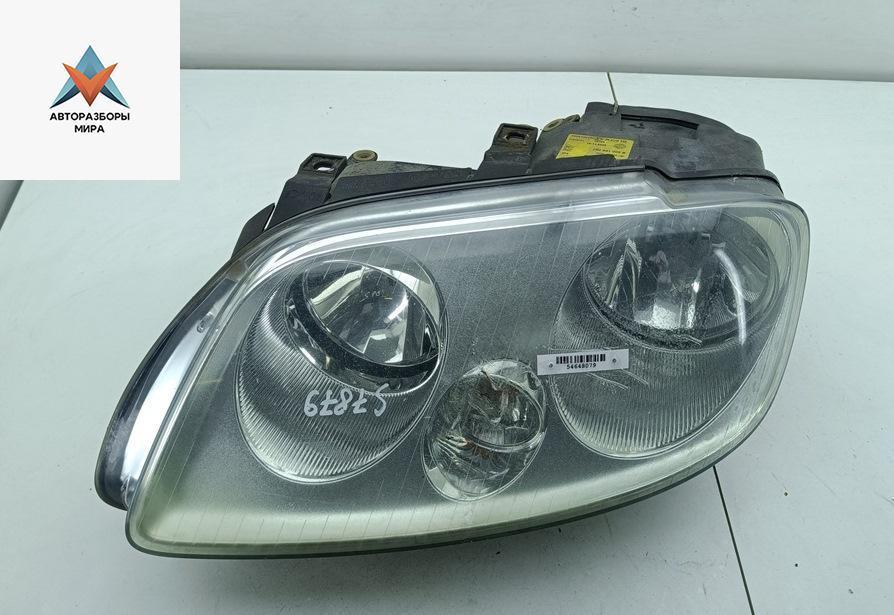 фара левая Volkswagen Caddy 3 поколение 2005, 2.0 л., дизель, МКПП, белый, фургон, 2K0941005B - фото №1