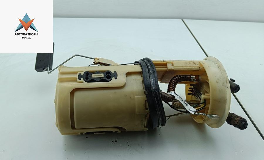 насос топливный Volkswagen Passat B5 1999, 1.8 л., бензин, МКПП, серый, универсал, 8E0919051 - фото №1